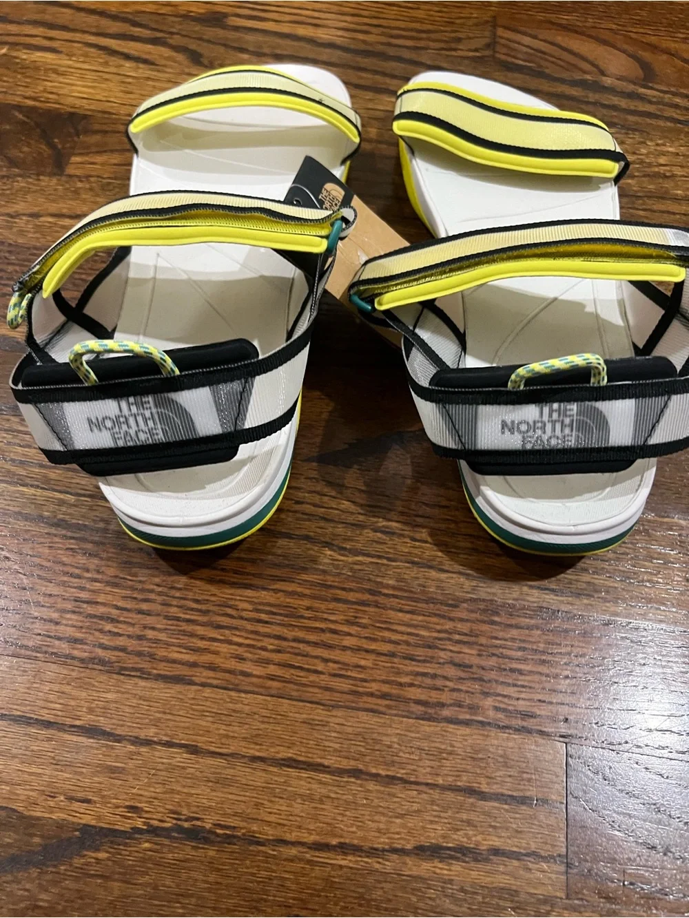 The North Face Skeena sport sandals, featuring a white footbed and bright yellow